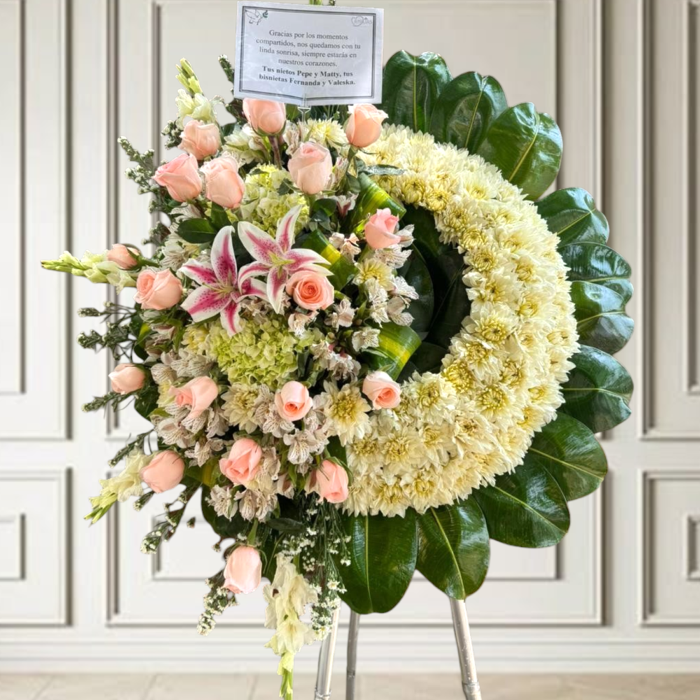 Corona fúnebre con rosas rosadas