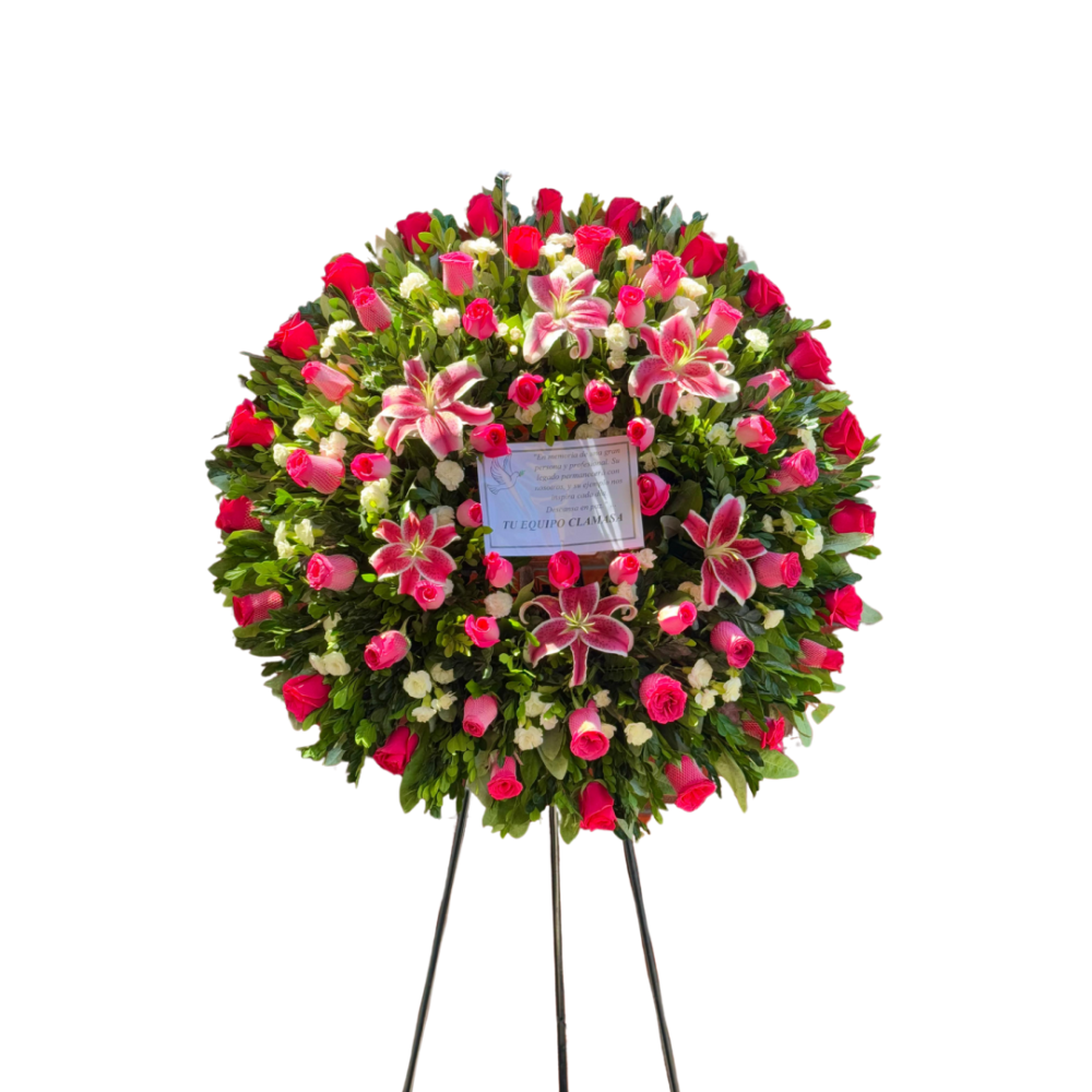 Corona fúnebre modelo picarón con rosas fucsias