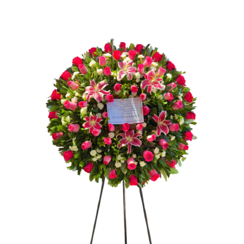 Corona fúnebre modelo picarón con rosas fucsias