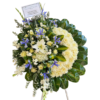 Corona floral fúnebre con “iris”