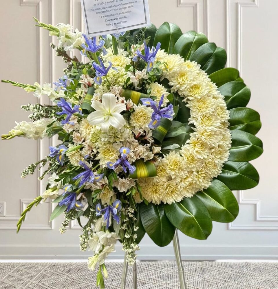 Corona floral fúnebre con “iris”