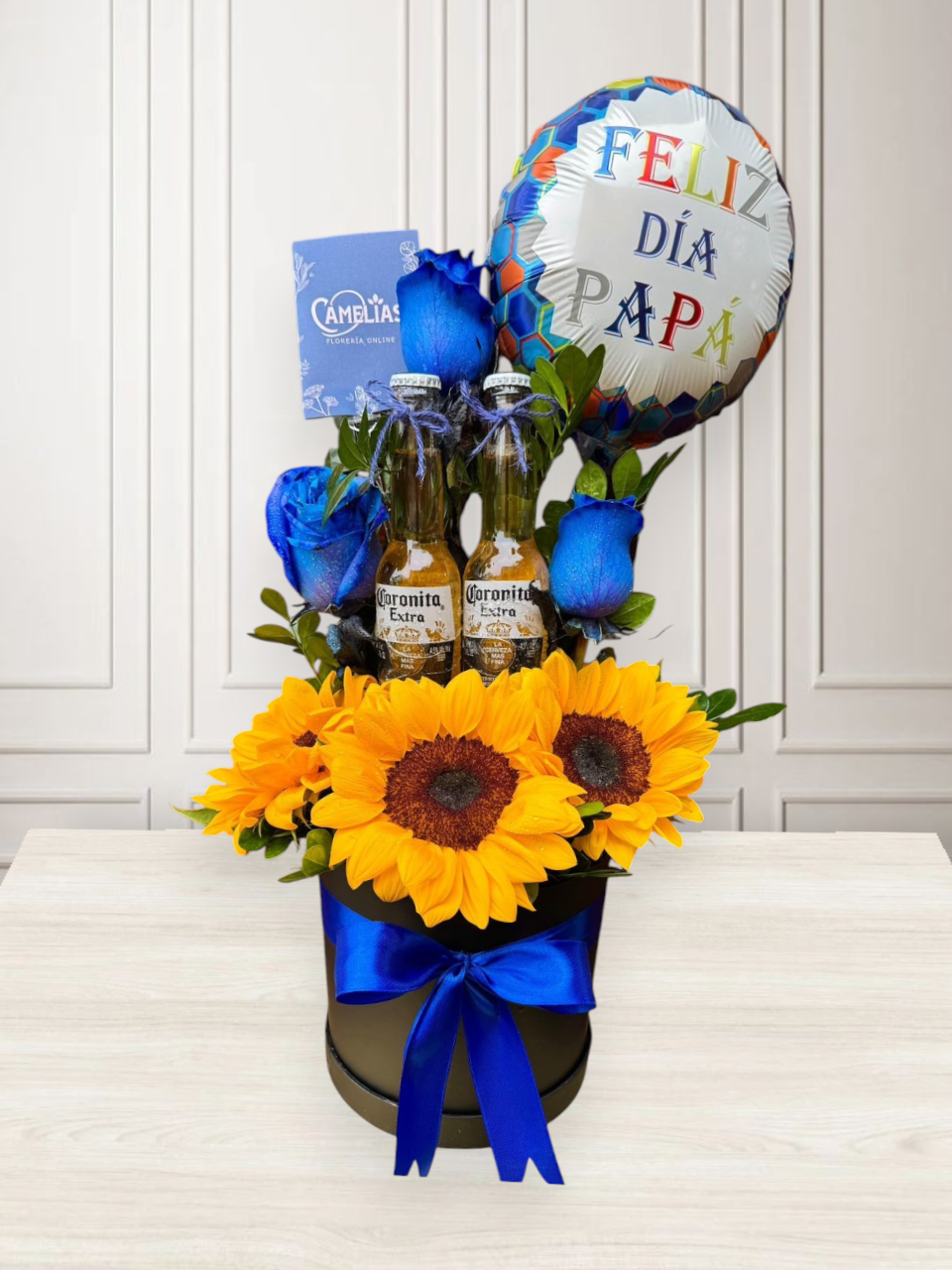 Box de rosas azules y corona