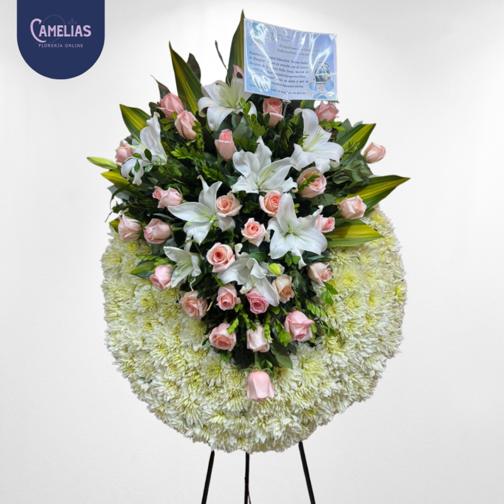 Corona fúnebre de rosas y lirios “paz celestial”