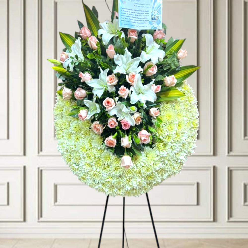 Corona fúnebre de rosas y lirios “paz celestial”