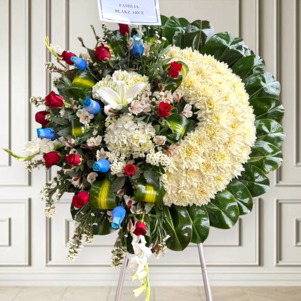 Corona fúnebre de rosas azules y rojas  “Memorial”